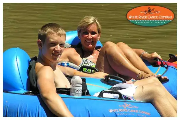 a couple of people that are sitting on a boat